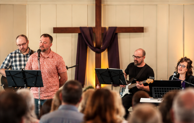 Glad Tidings worship team leading a Sunday service